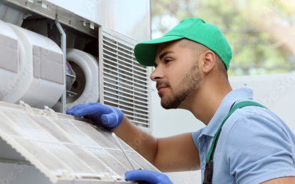 AC technician expert working on installation